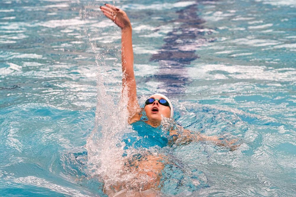 Monroe-New Glarus Swimmers Surge Through Triple-Dual Meet
