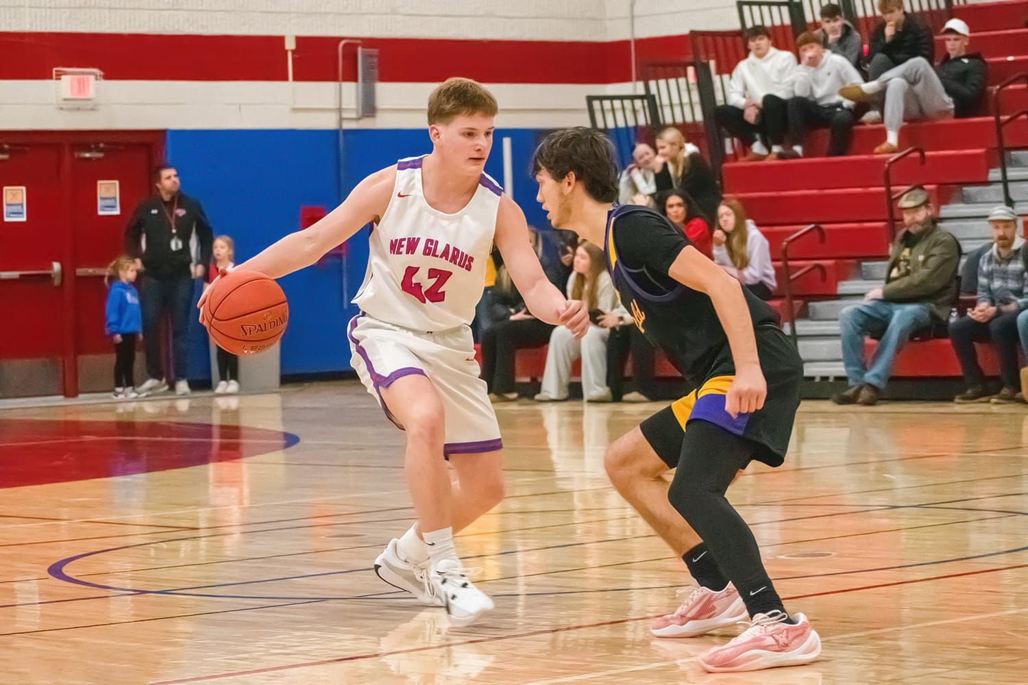 New Glarus Survives Barneveld Rally, Pulls Away Late for 56-45 Win