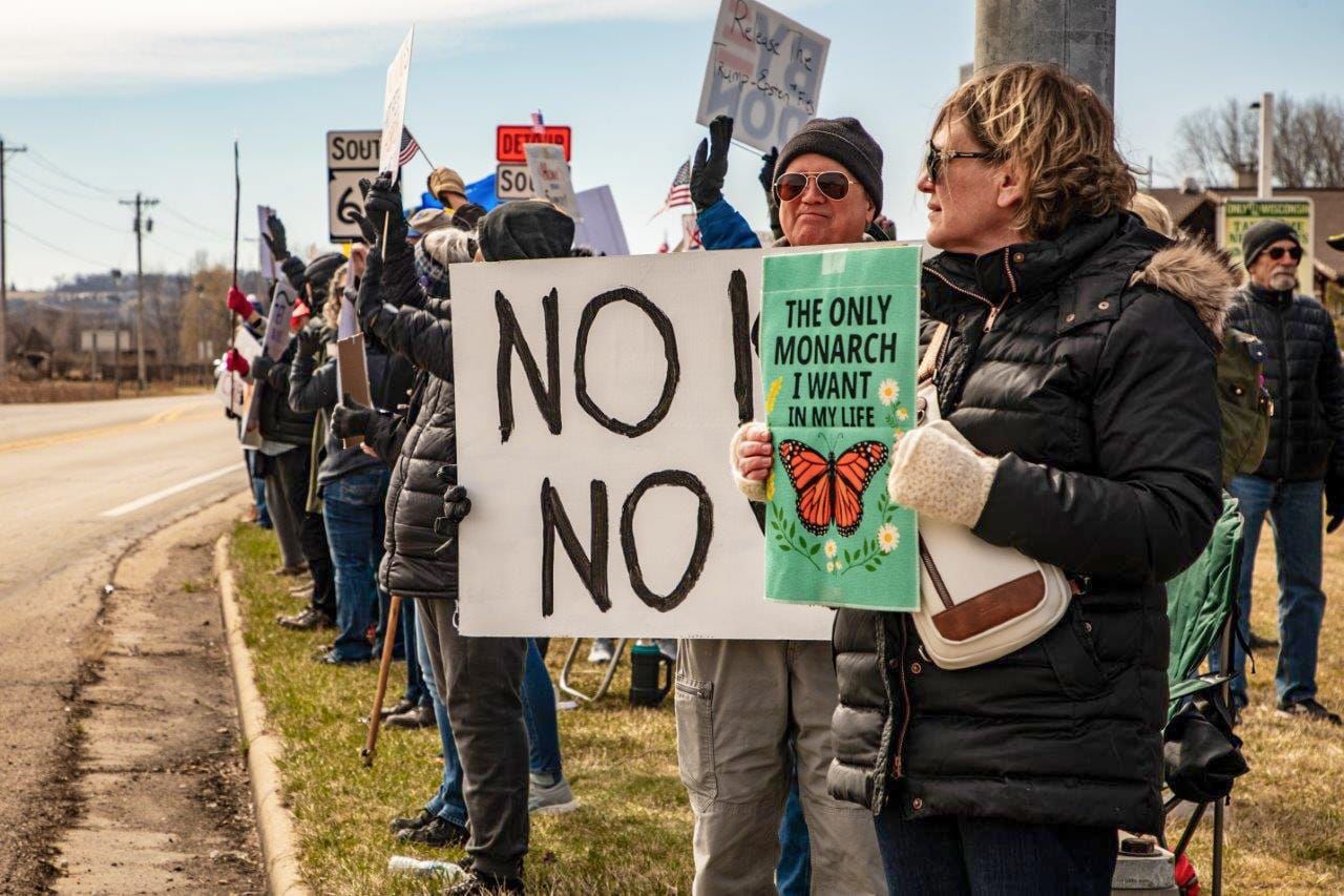 New Glarus Rally Draws Demonstrators to Highway 69