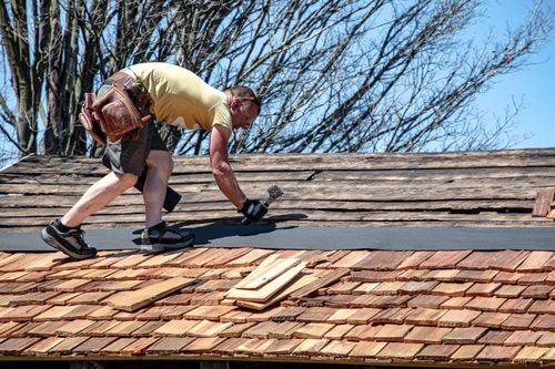 Old Log Cabin Roof Replaced at Swiss Historical Village Museum