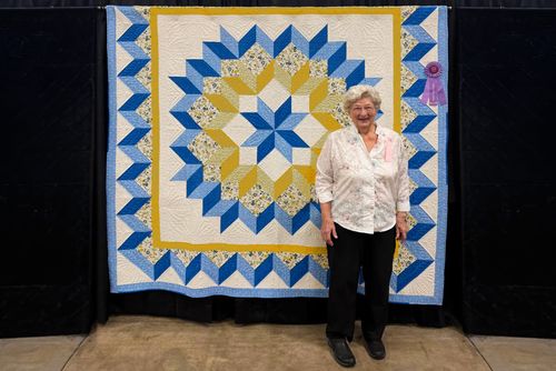 Former New Glarus Restaurant Owner Honored at Quilt Show