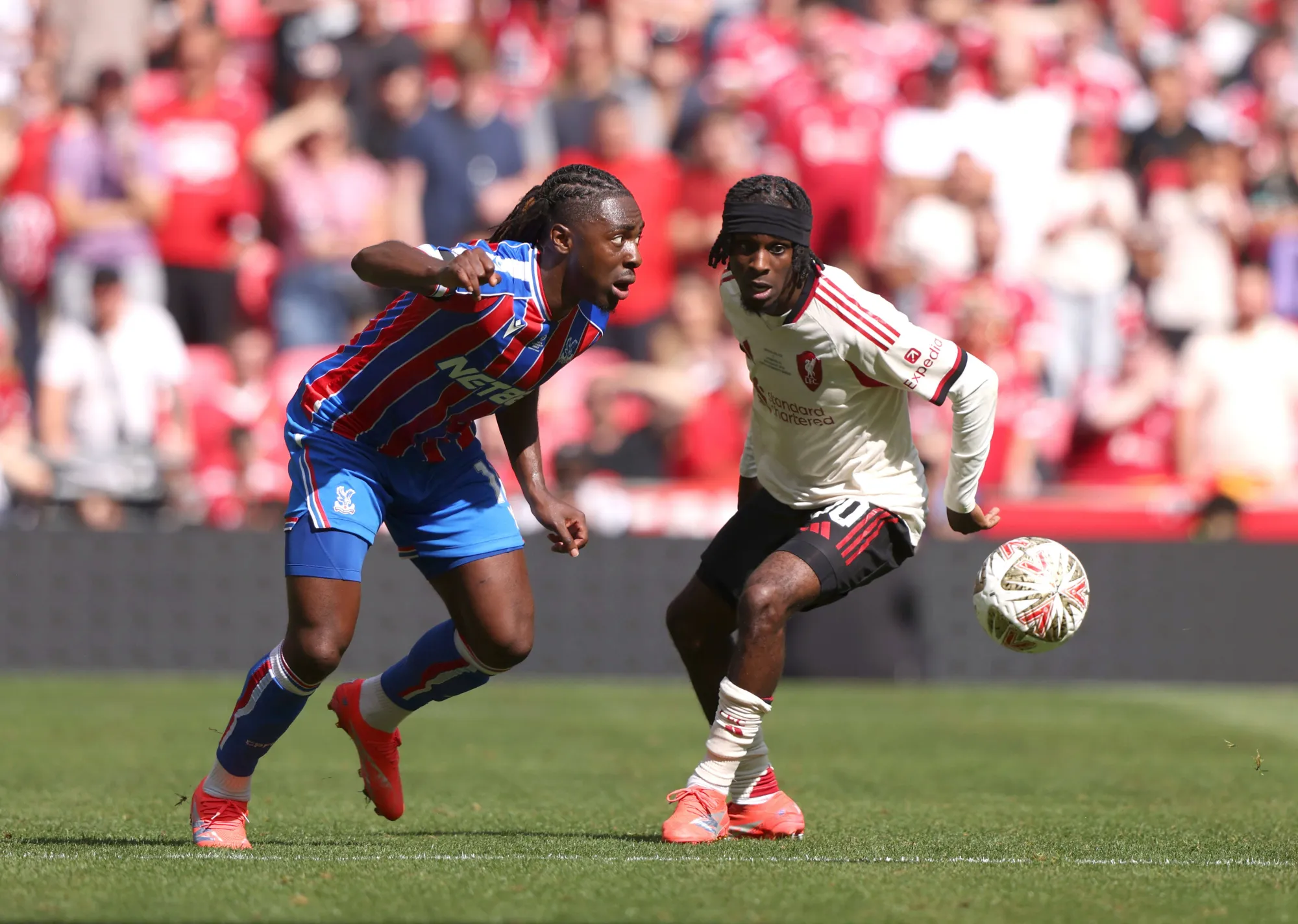Eberechi Eze takes on Jeremie Frimpong in the FA Cup final between Liverpool and Crystal Palace at the Wembley Stadium