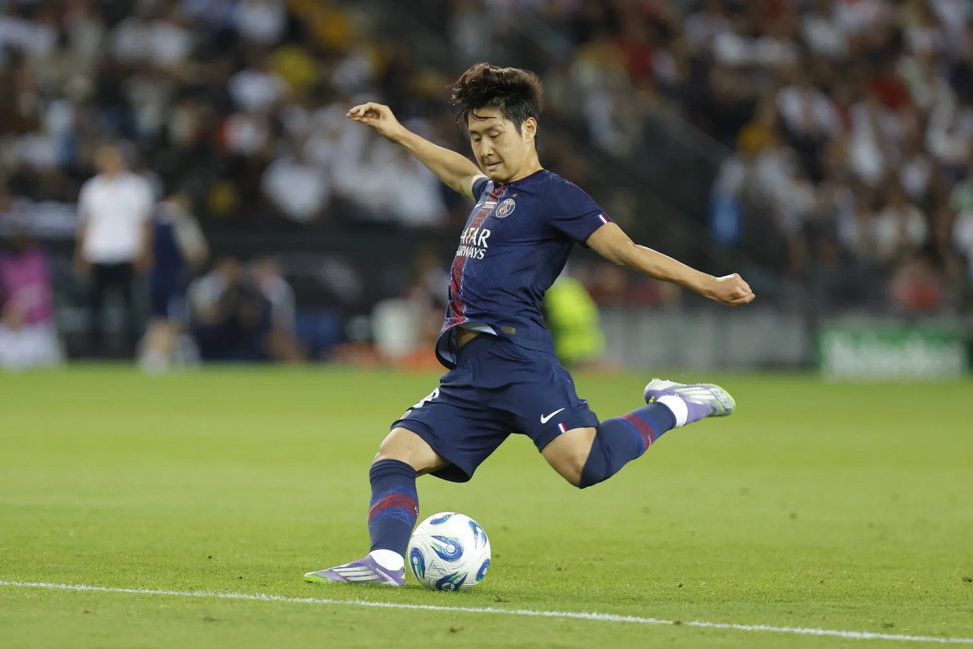 Lee Kang-In of Paris Saint-Germain shoots against Tottenham Hotspur in the UEFA Super Cup final at the Bluenergy Stadium