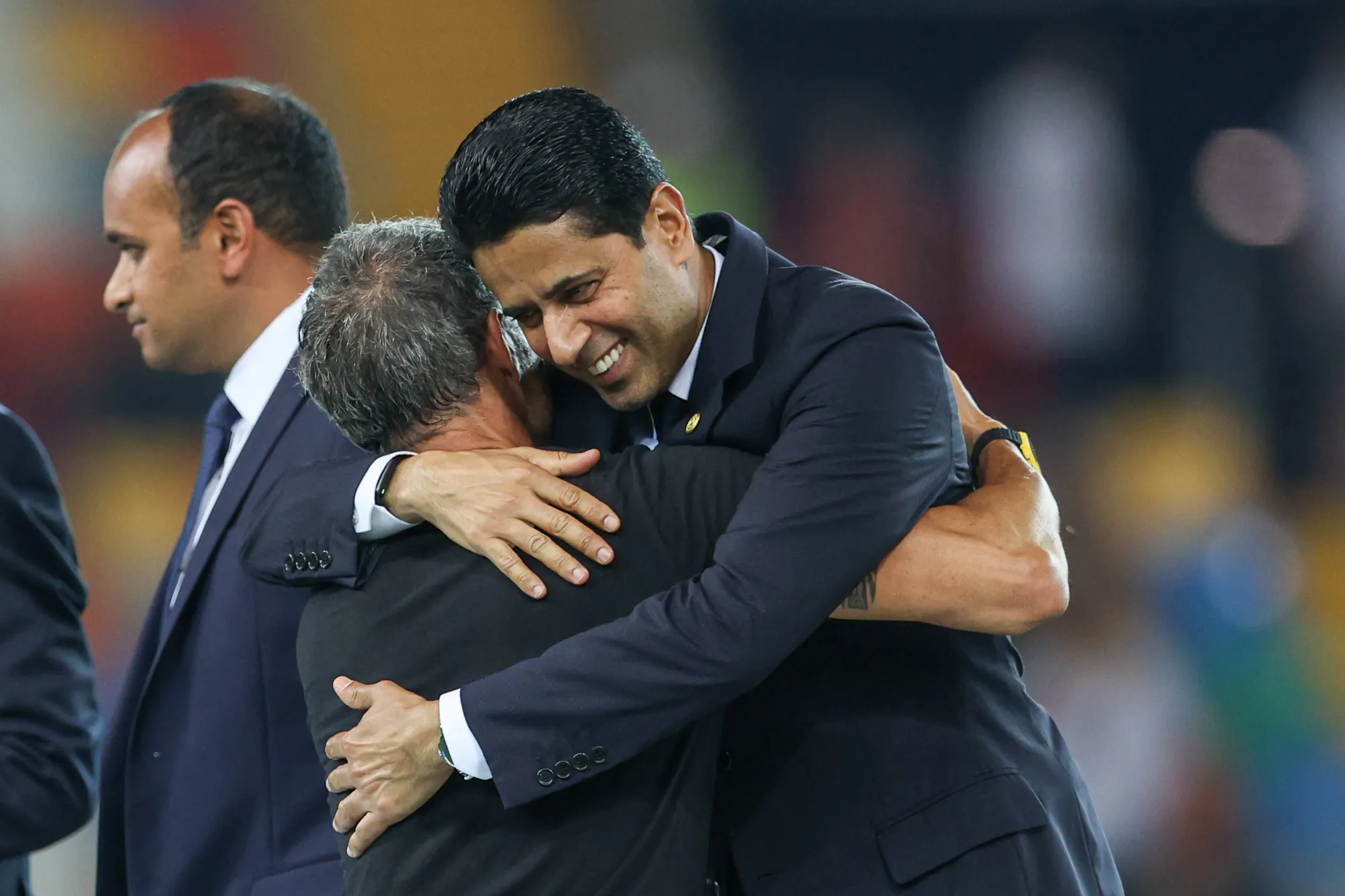 PSG head coach, Luis Enrique embraces PSG President, Nassir El-Khelafi after the UEFA Super Cup final at the Bluenergy Stadium