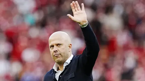 Arne Slot acknowledges the supporters after the game (Peter Byrne/PA)
