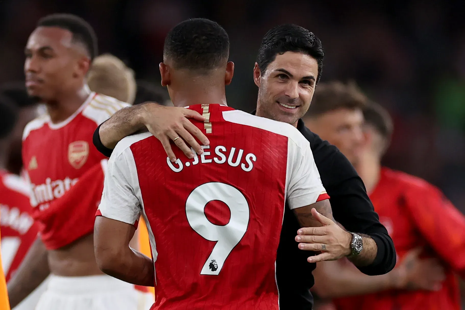 Mikel Arteta celebrates with Gabriel Jesus after victory over Manchester City