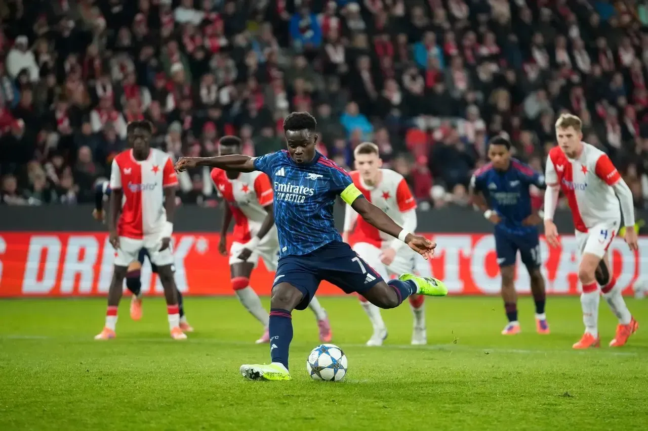 Saka scores against Slavia Praque (Petr David Josek/AP)