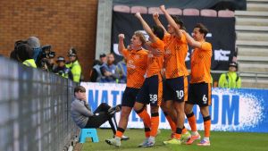 Cardiff Clinch 2-0 Victory at Wigan to Boost Promotion Hopes