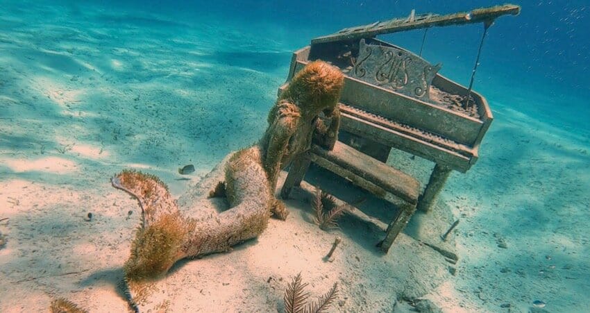 mermaid playing piano