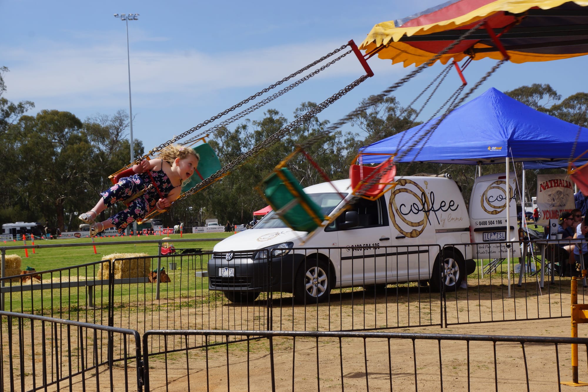 Thrilling ... Jemma Murphy enjoys the swing ride.