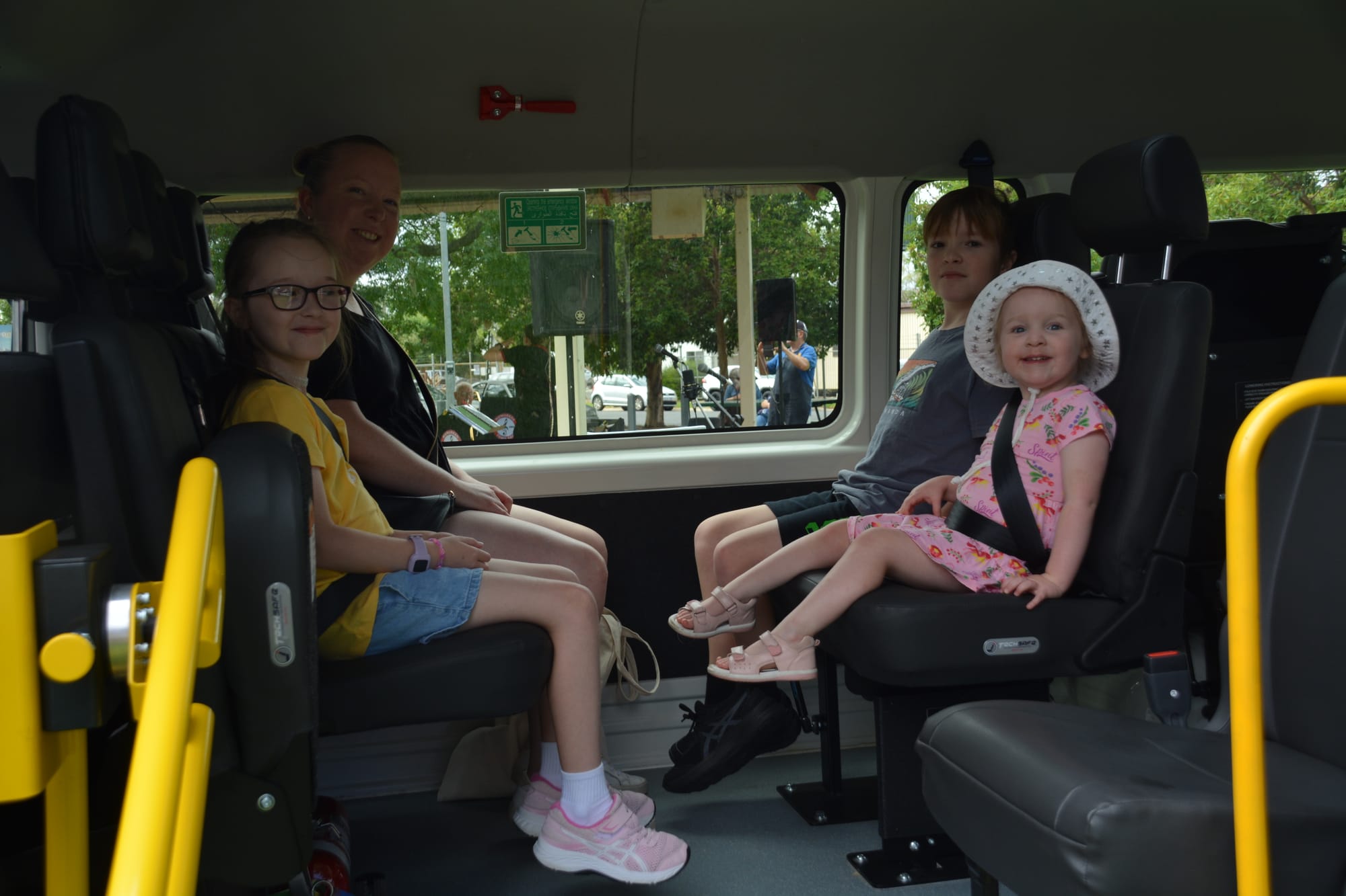 A real asset... The Pearson family inspect the all abilities community bus at the fundraiser on Saturday; clockwise from back left: Emma, Brooke Hannah and Liam Pearson. 