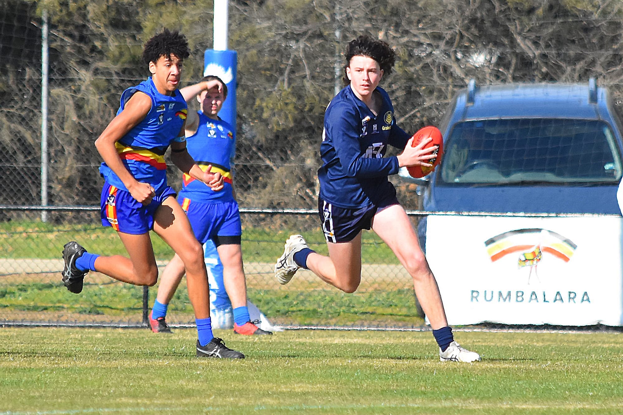 Dashing defender ... Reeve Verhoeven runs the ball out of the backline for Numurkah thirds