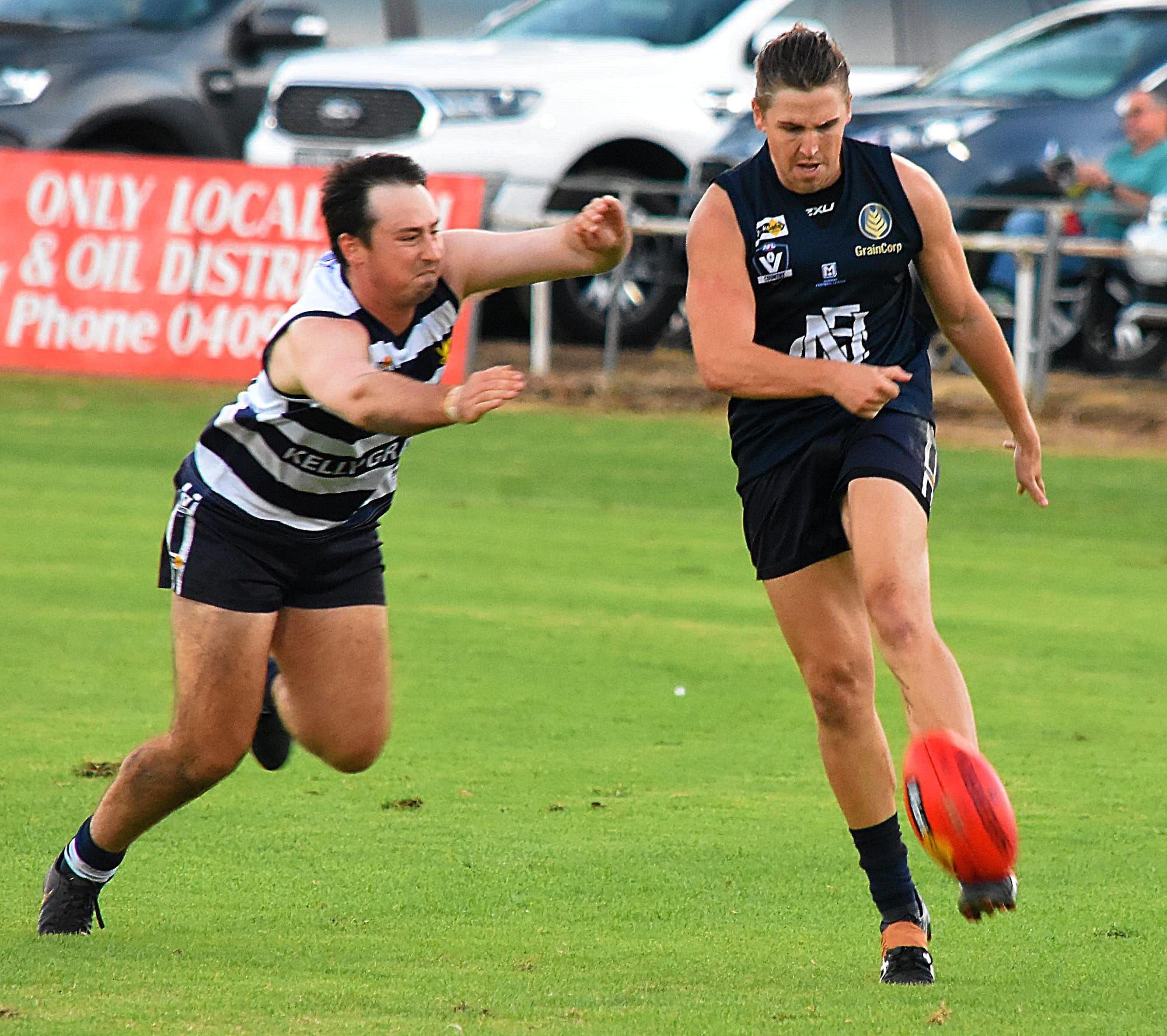 Got it away... James Pruden just gets a kick away before being tackled in the reserves. 