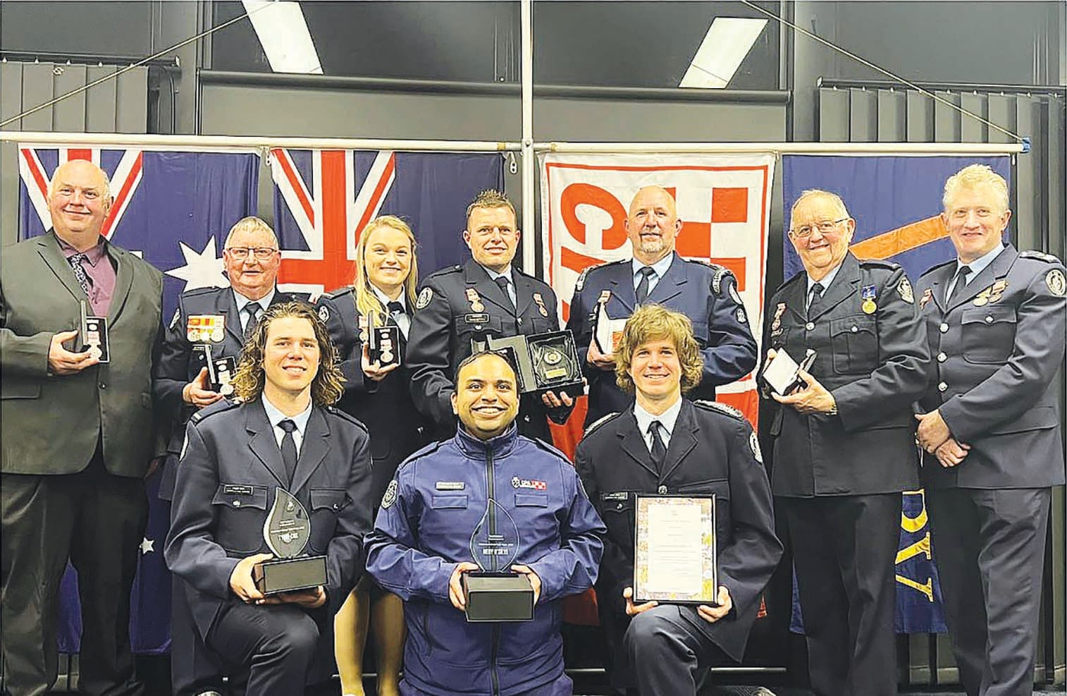 Local heroes... Back (from left): Darren Cox, Ian Hannaford, Makayla O’Callaghan, Chris Bethell, Jason Cox, Peter Cox and Charlie Cleary.  Front: Tyler Cox, Merv D’Silva and Dale Cox.