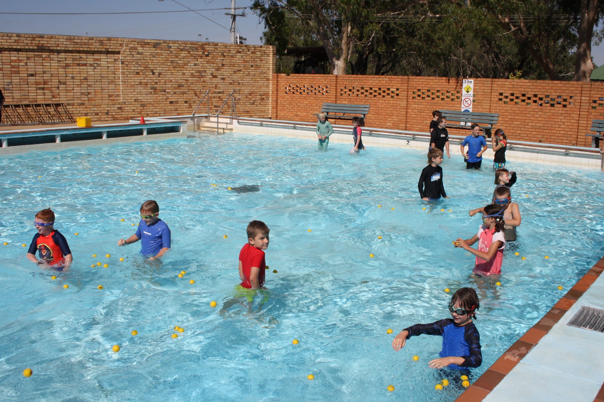 Grab those points... Novelty events such as ‘collect as many golf balls as you can’ were a popular way for students to earn extra points towards their house totals.
