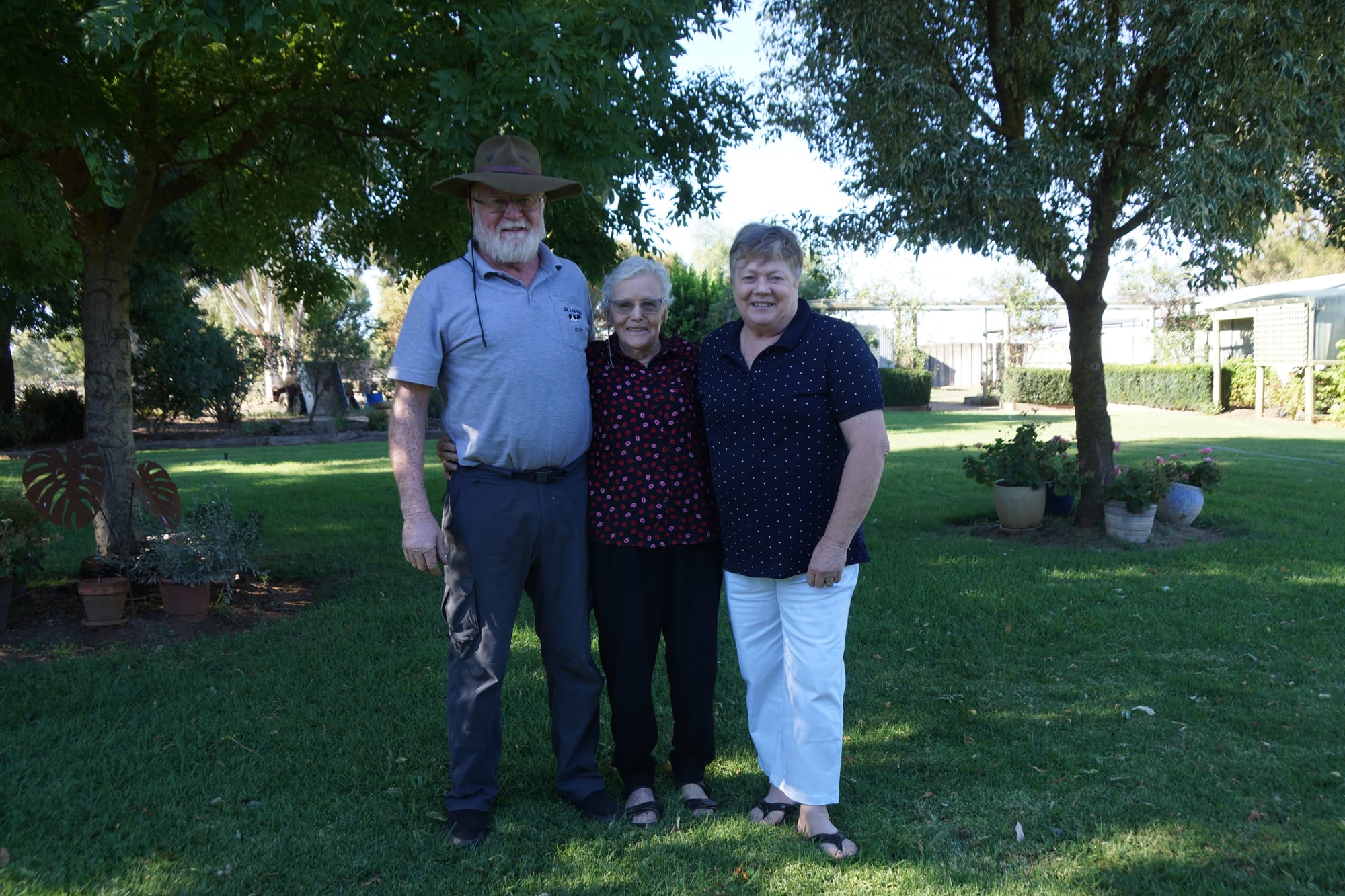 Some things change, some stay the same... (From left): Geoff, Hazel and Cheryl in the backyard of the block they grew up on. 
