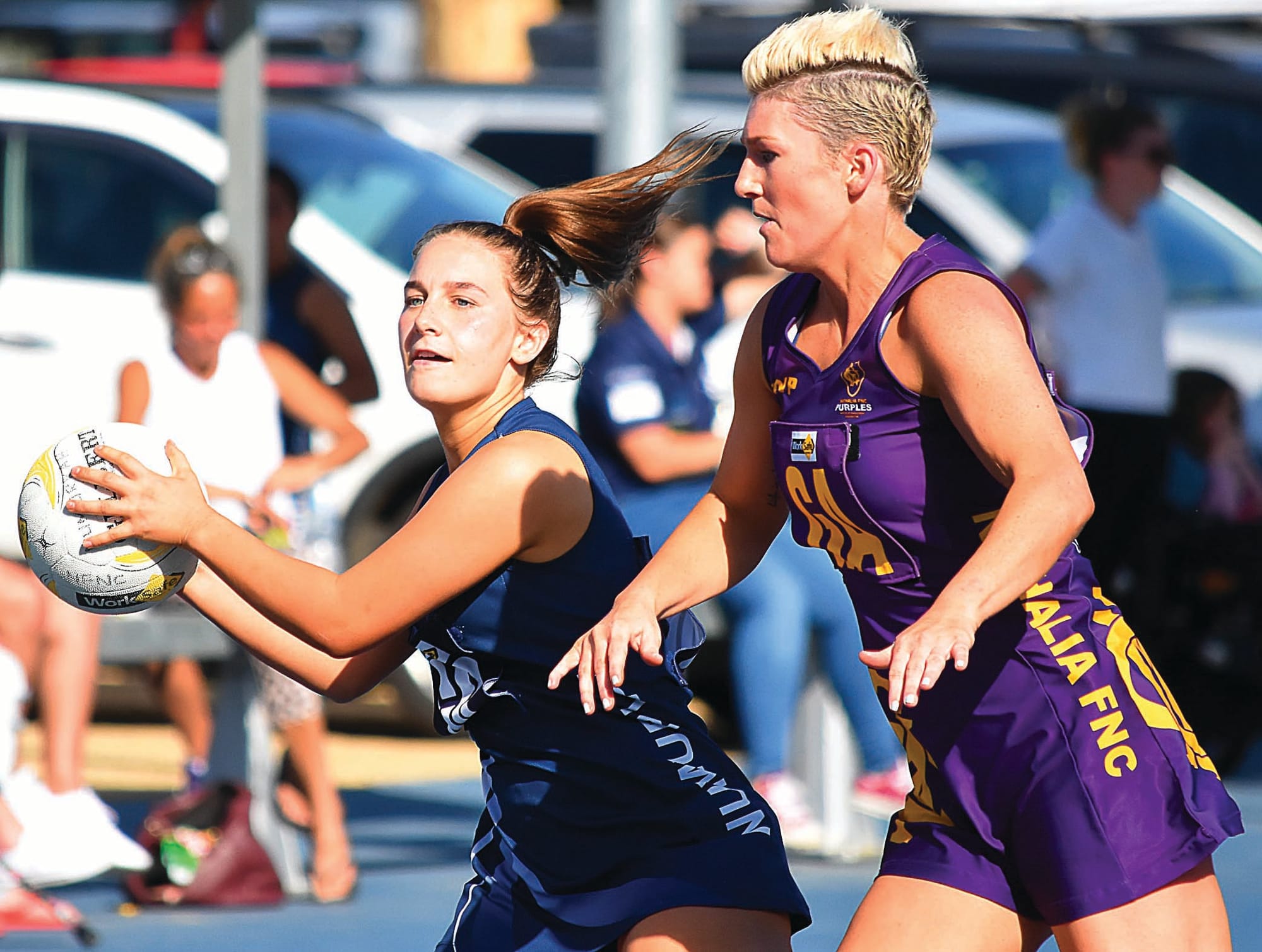 Got it... Numurkah’s Chelcee Schubert picks up an intercept in front of Nathalia’s Tamara Skinner in A-grade. 