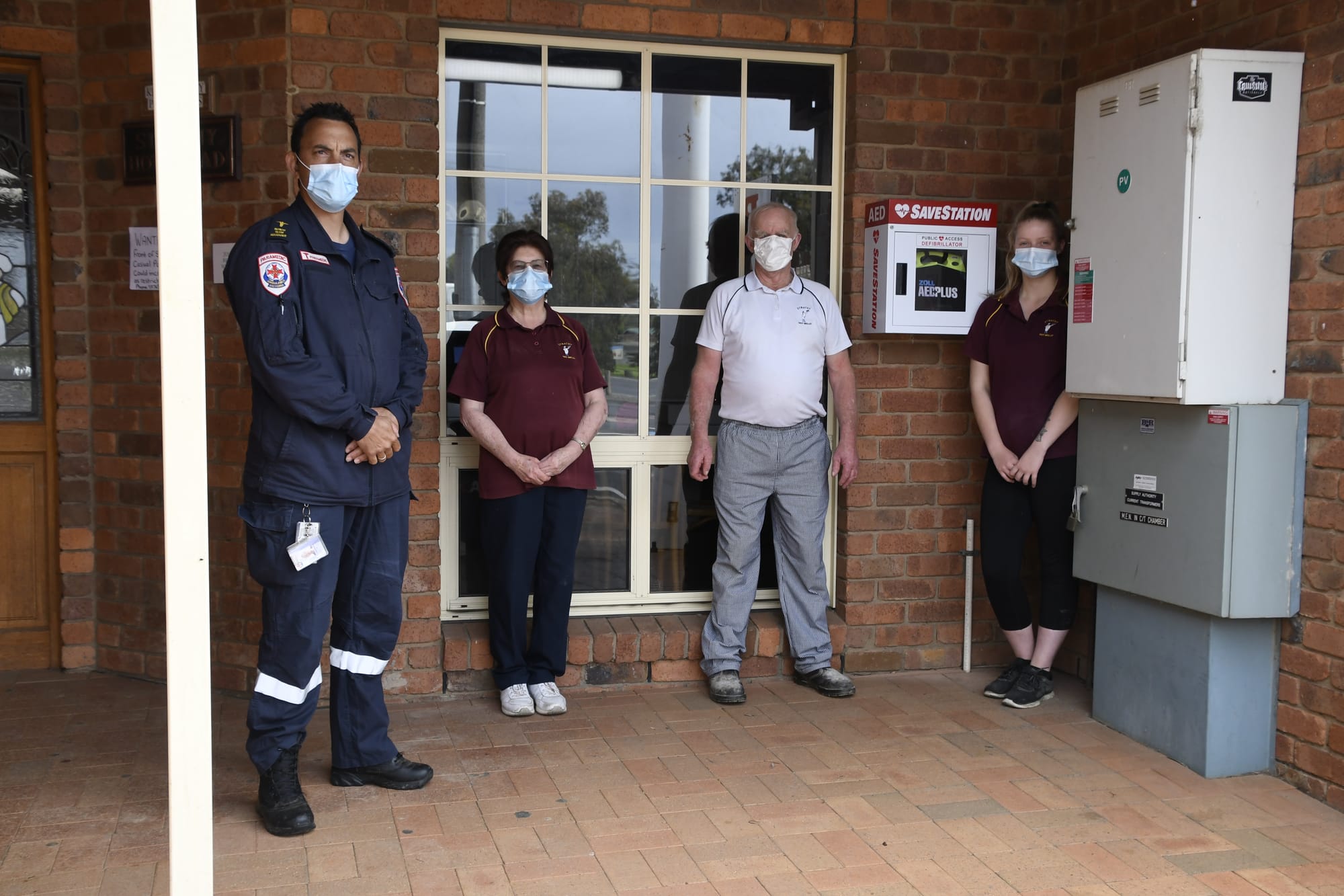 Lifesaving device ... Senior Ambulance Victoria team manager for Numurkah, Craig Beamish, and Strathmerton Bakery staff Heather McCoy, Ray Kelly and Briony Scott are glad that the AED is now in place.  
