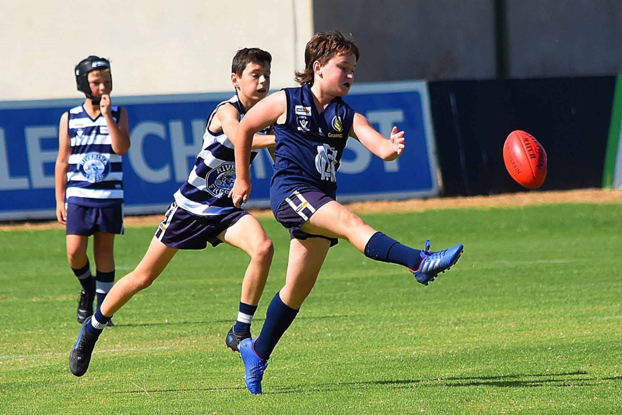 Good skills... Sol Frost gets boot to ball in the fourths. 