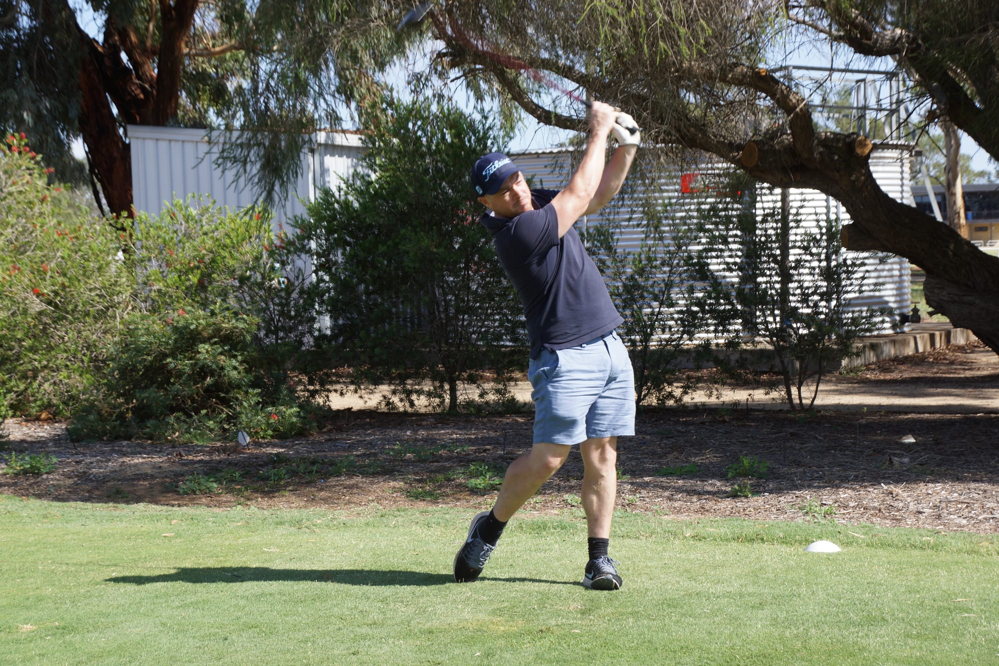Early leader ... Brady Trotter tees off for his final round on Monday.
