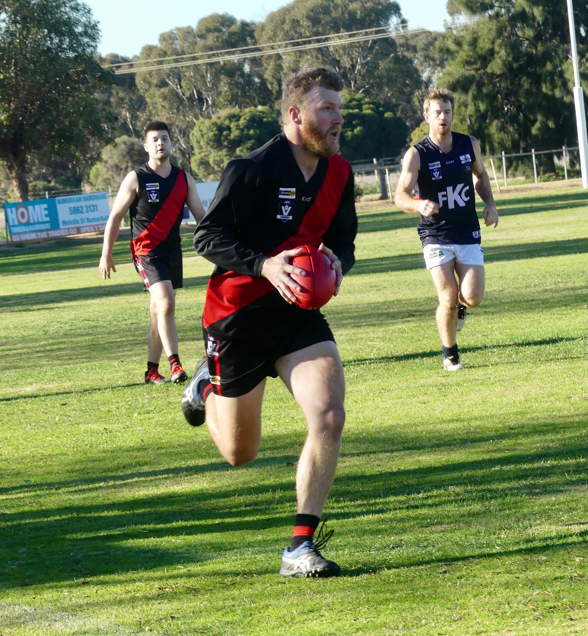 On the burst ... Tim Belford carries the ball down the wing. 

