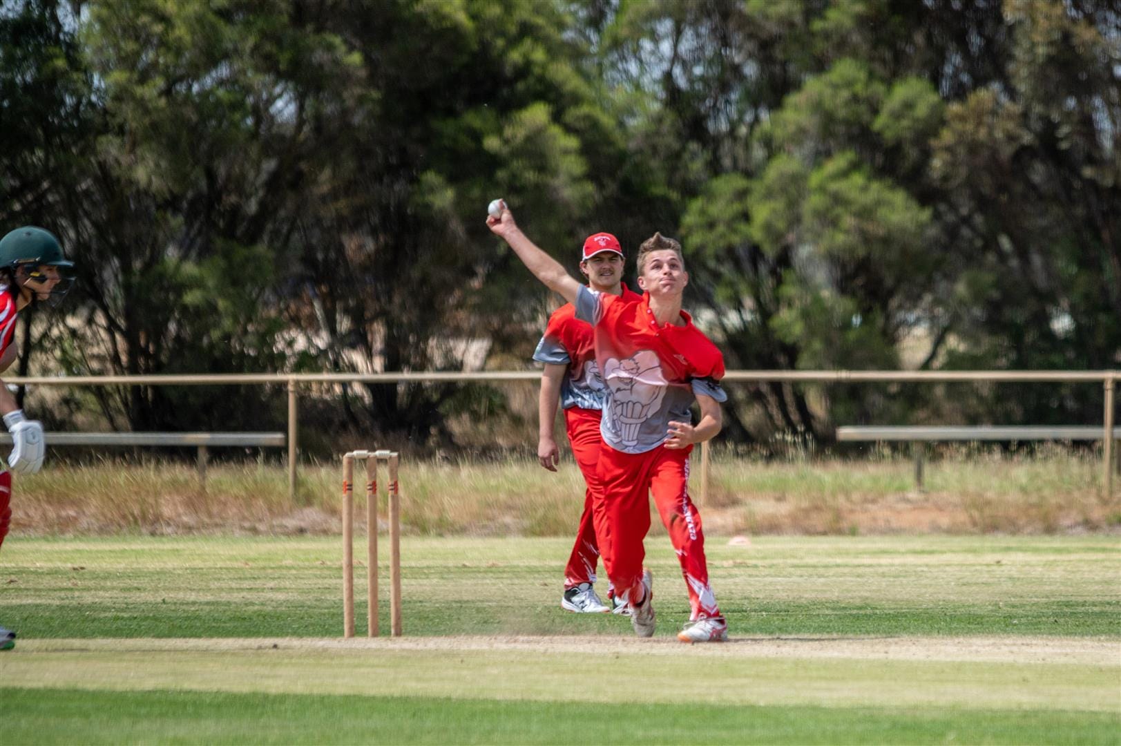 Giving his all... Katunga bowler Dylan Baker steams in to bowl. 
