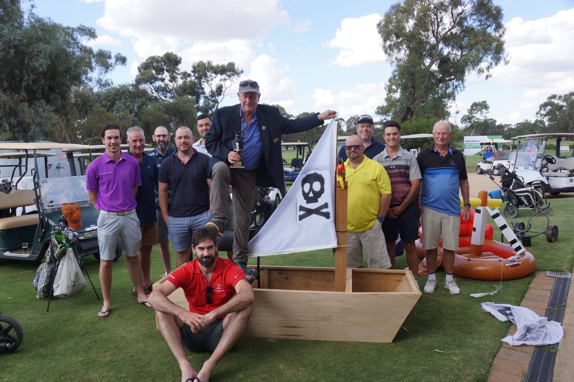 Ye scurvy dog ... Hoax Triples winner Greg Trotter  gives it to NAGA Jason Brun, surrounded by the rest of the top 10 finishers (from left): Brandan Hosie, Gary Blackburn, David Dell, Brady Trotter, Nick Ludington, Darren Booth, Matt Trotter, Tyler Booth and Alan Dalton.