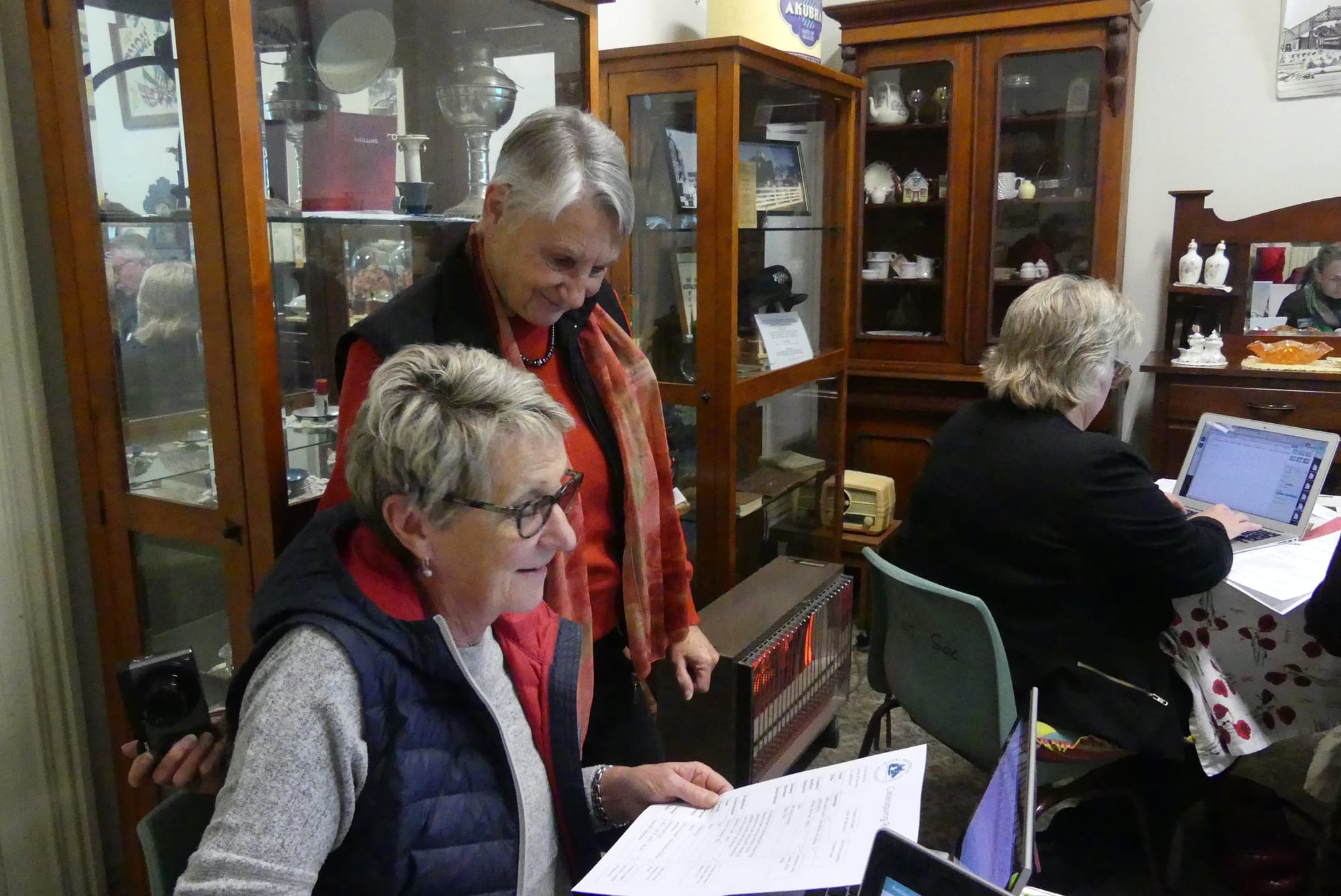 Learning together ... Bernadette Steward from Numurkah & District Historical Society and Alleyne Hockley from Castlemaine discuss cataloguing terms.
