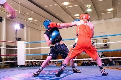 Whack... Marcus Davis (right) lands a hefty blow to the face of Hayden Daymond.