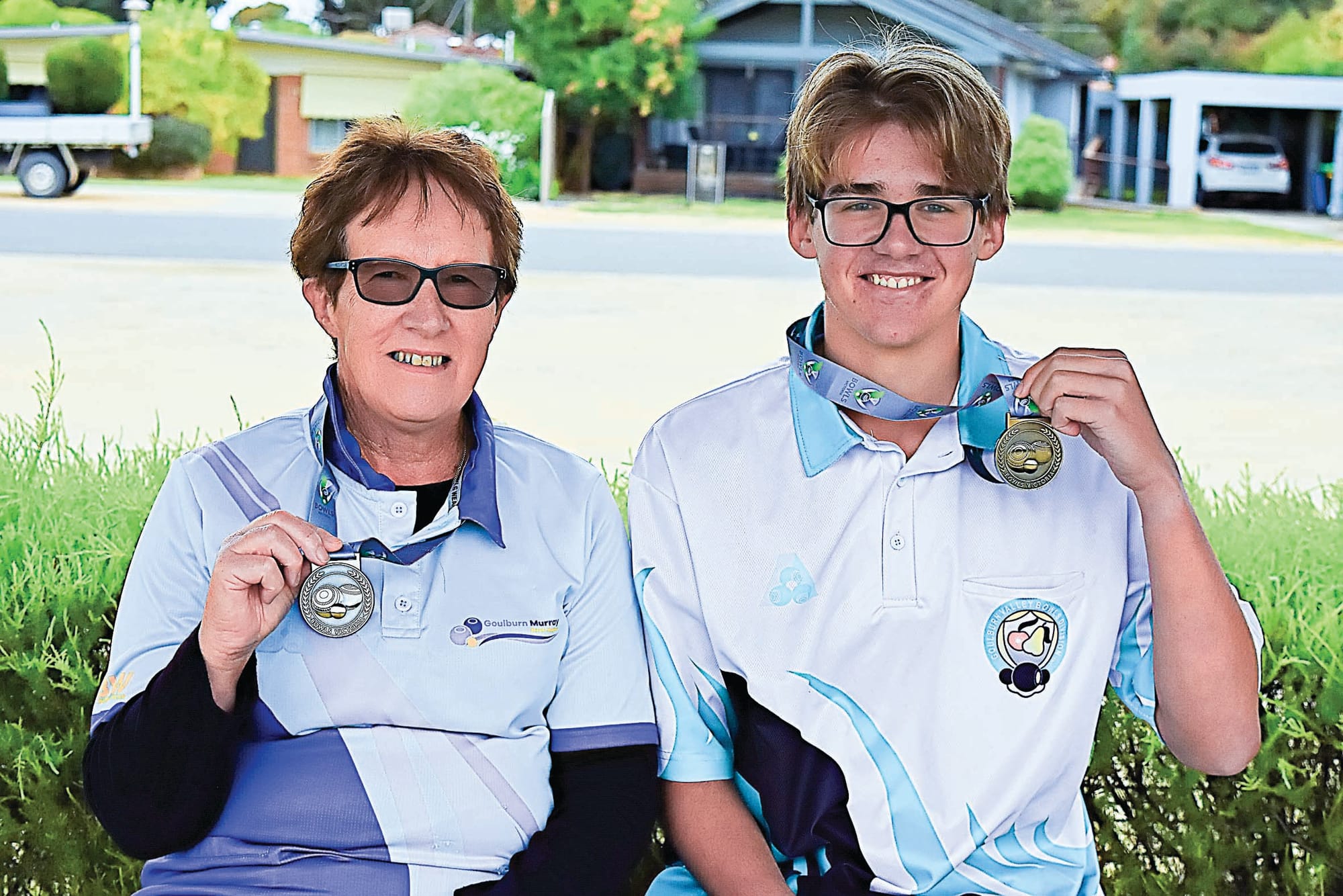 Impressive efforts... Loris Houlihan and Bayden Parkinson with their medals. 