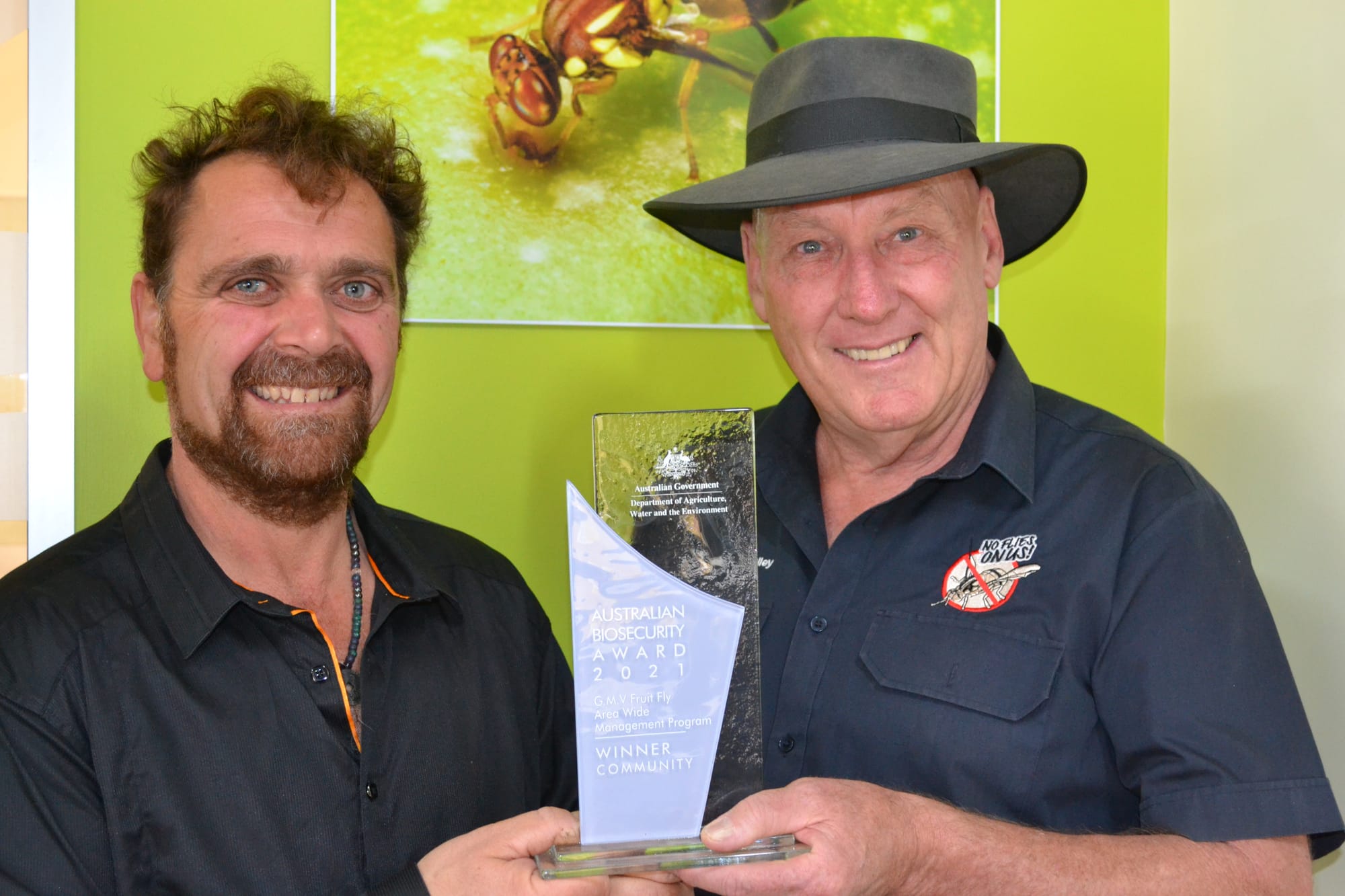 Biodiversity stars... Chair of the Goulburn Murray Valley Fruit Fly Area Wide Management Program governance group and president of the Cobram and District Fruit Growers Association, Tony Siciliano (left) and program coordinator Ross Abberfield proudly display the 2021 Australian Biosecurity community award.
