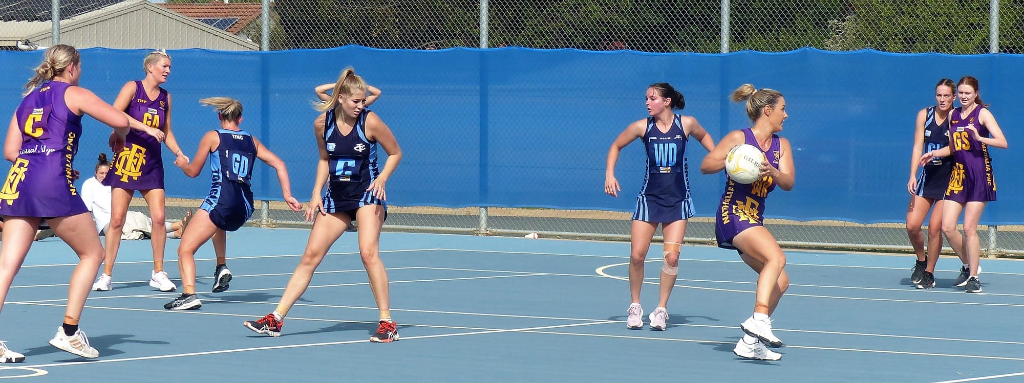 Leading from the front... Nathalia coach Emma McDonald has the ball in an aggressive spot on the court.
