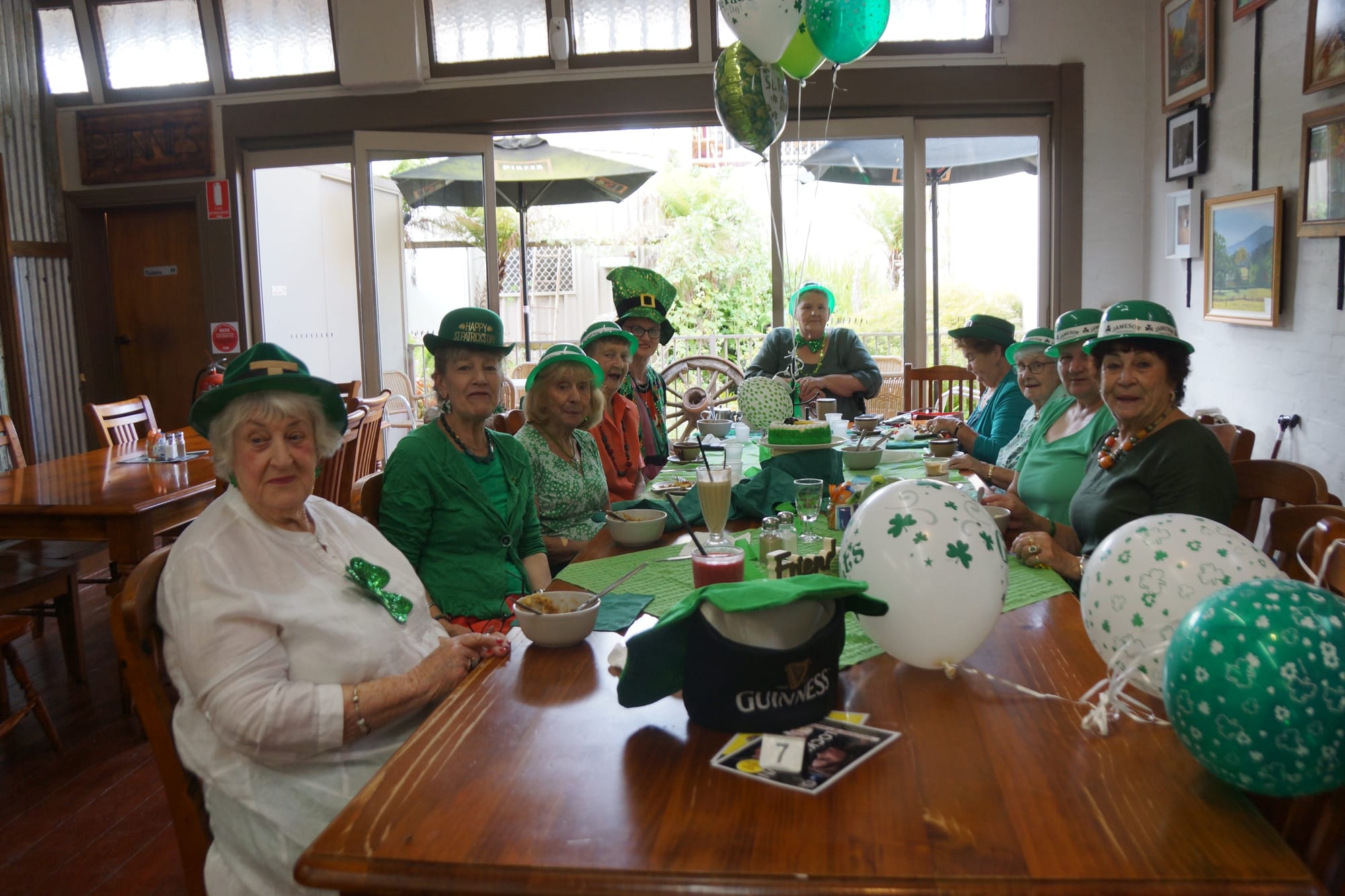 Ladies who lunch... (Clockwise from front left): Heather Dempster, Loris Russell, Tress Fothergill, Joan Graham, Elvie Newby, Lyn Poole, Athalia Mayberry, Margaret Pell, Annemaree Mayberry and Leonie McDonald enjoy a special St Paddy’s Day feast.

