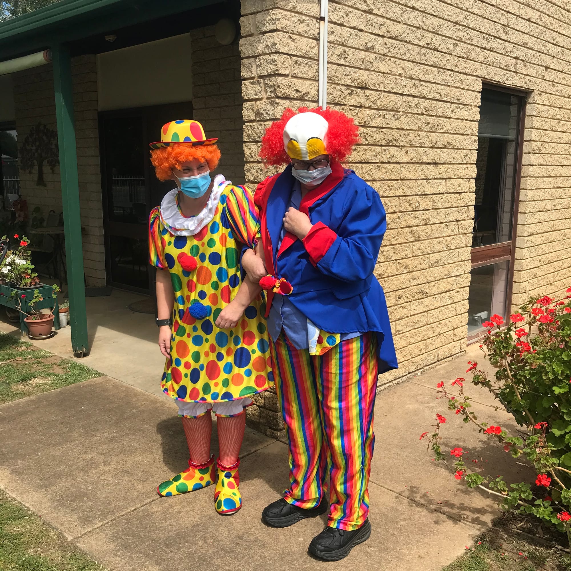 Clowning around ... Staff members Adele McMaster and Colleen Doncon were happy to help provide all the fun of the fair.
