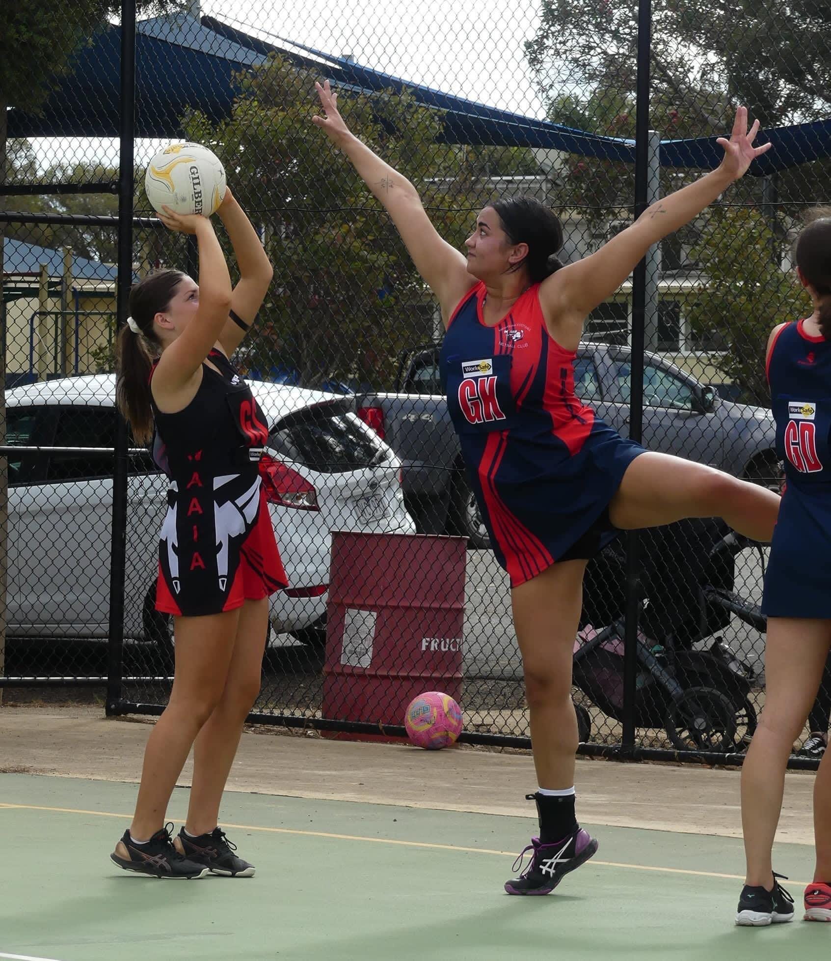 Putting it up... Ella Bryant shoots for goal in her debut A-grade game.