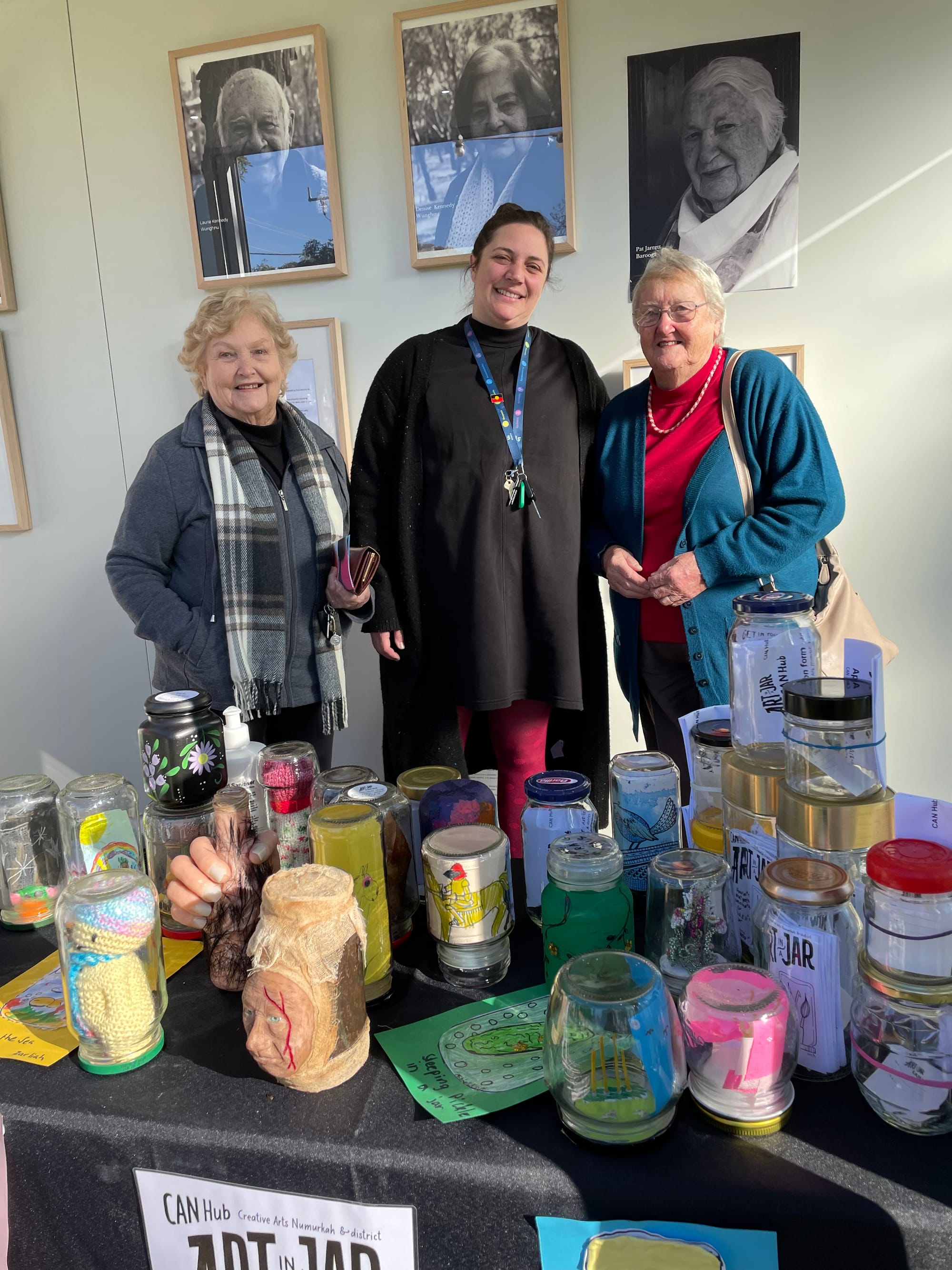Art in a jar... (From left): Elaine Hall,  Moira Shire Arts, Culture and Events Team Leader Kirsten Retallick and Alison Cook enjoyed the Our Seniors exhibition yesterday.