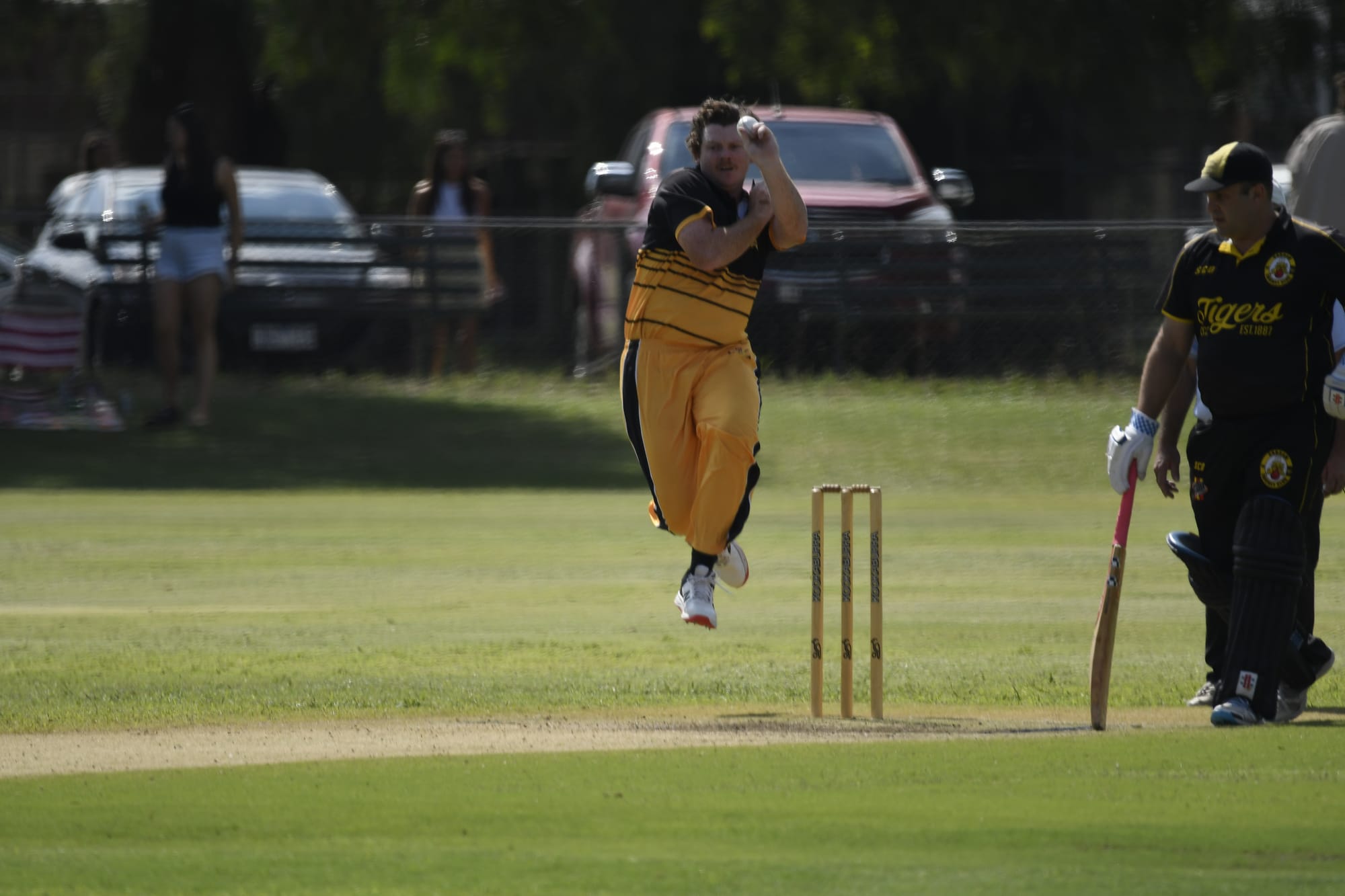 Star quick... Jimmy Irvine steams in to bowl. 
