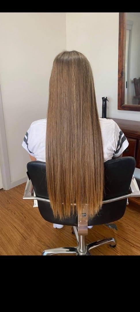 Before ... After over two years without a serious hair cut, Ella’s hair had grown past her waist.
