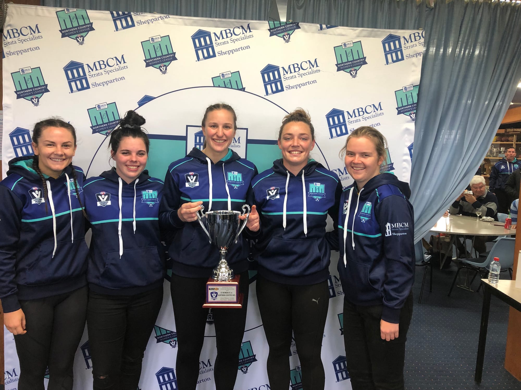 Winning reps ... Nathalia footballers who represented the Northern Country Women’s League with winning cup, (from left): Vanessa Ward, Marni Bell, Tegan Sutton, Sharnah  Stevens and Abby Favaro.