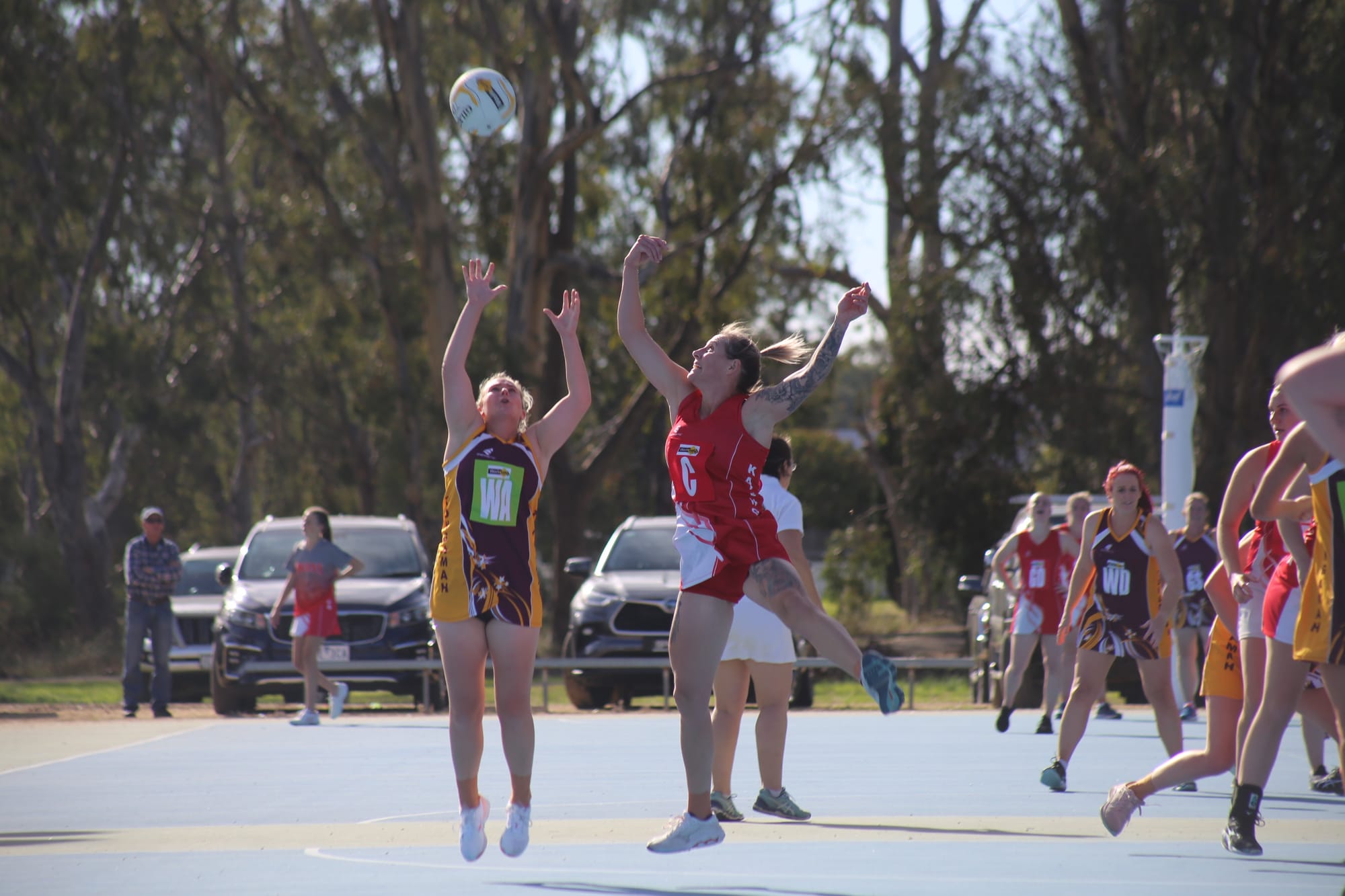 Competitor... Katunga coach Aimee Sidebottom competes for a ball in the air. 
