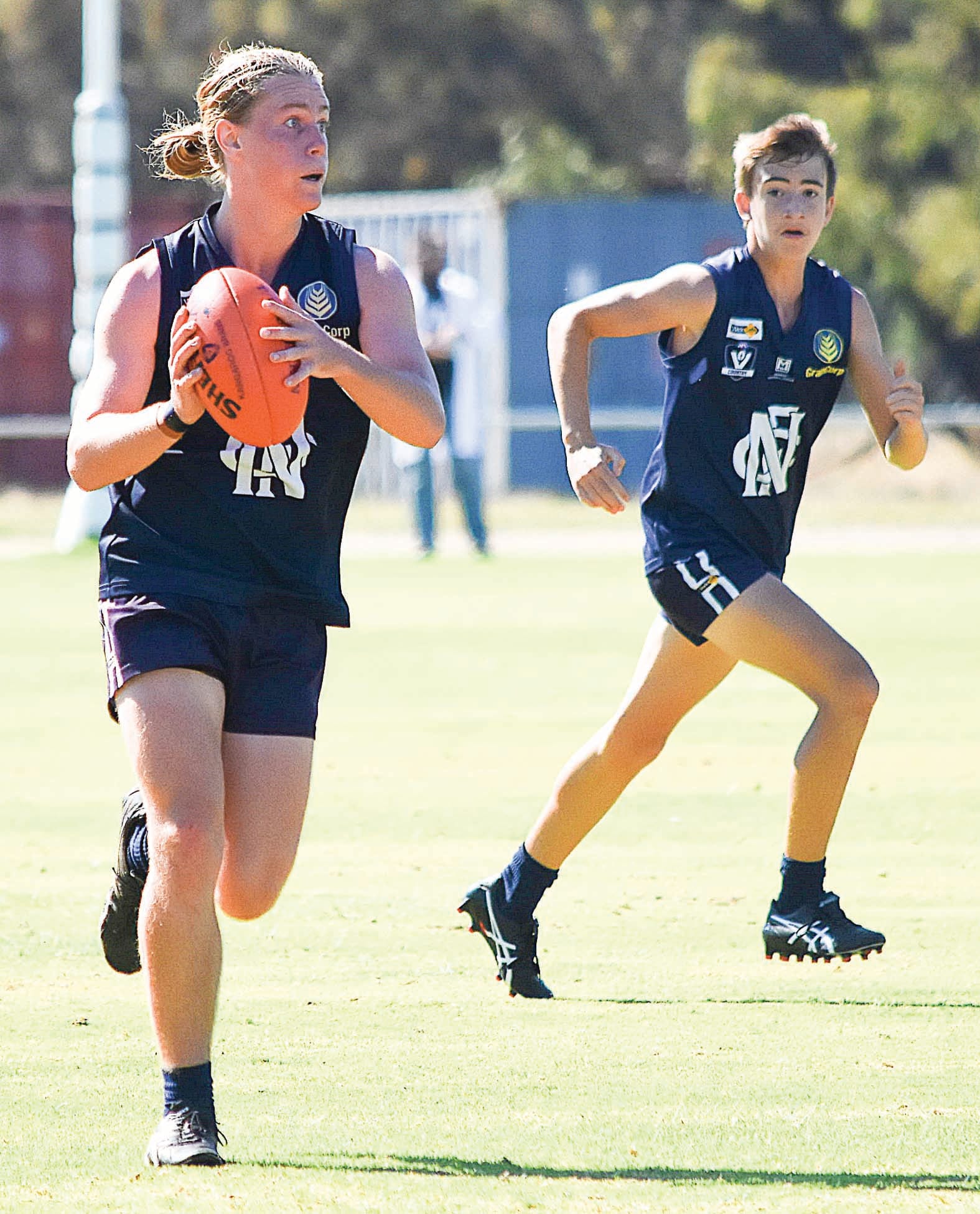 Looking for an option... Under 17s star Kobie Rahilly runs the ball out of defence. 