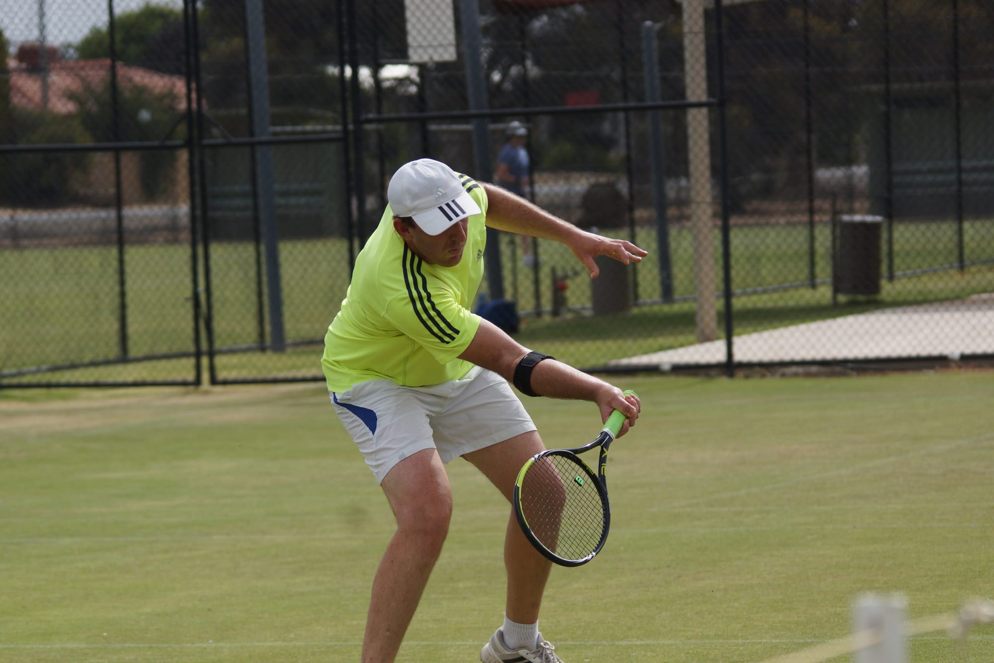 Show ‘em no mercy ... Grant Chappell plays a shot back over the net during his mixed win with Helene Steward.