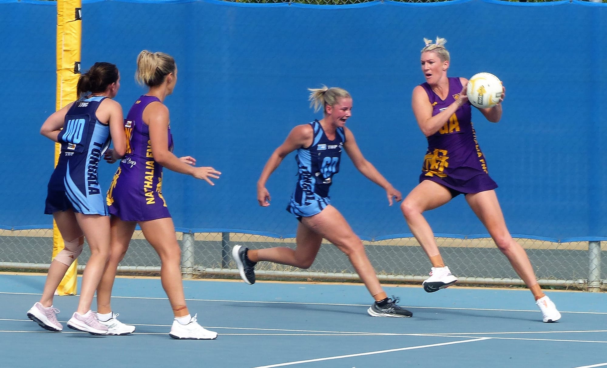 On the move... Athletic goal attack Tamara Skinner takes a ball on the edge of the circle. 