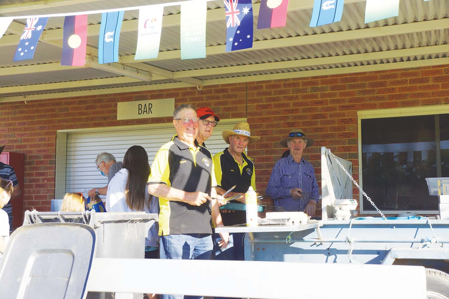 Feeding the people... Katamatite Lions Club members made sure everyone who wanted a hot breakfast got one, by cooking up a storm on the barbecue.
