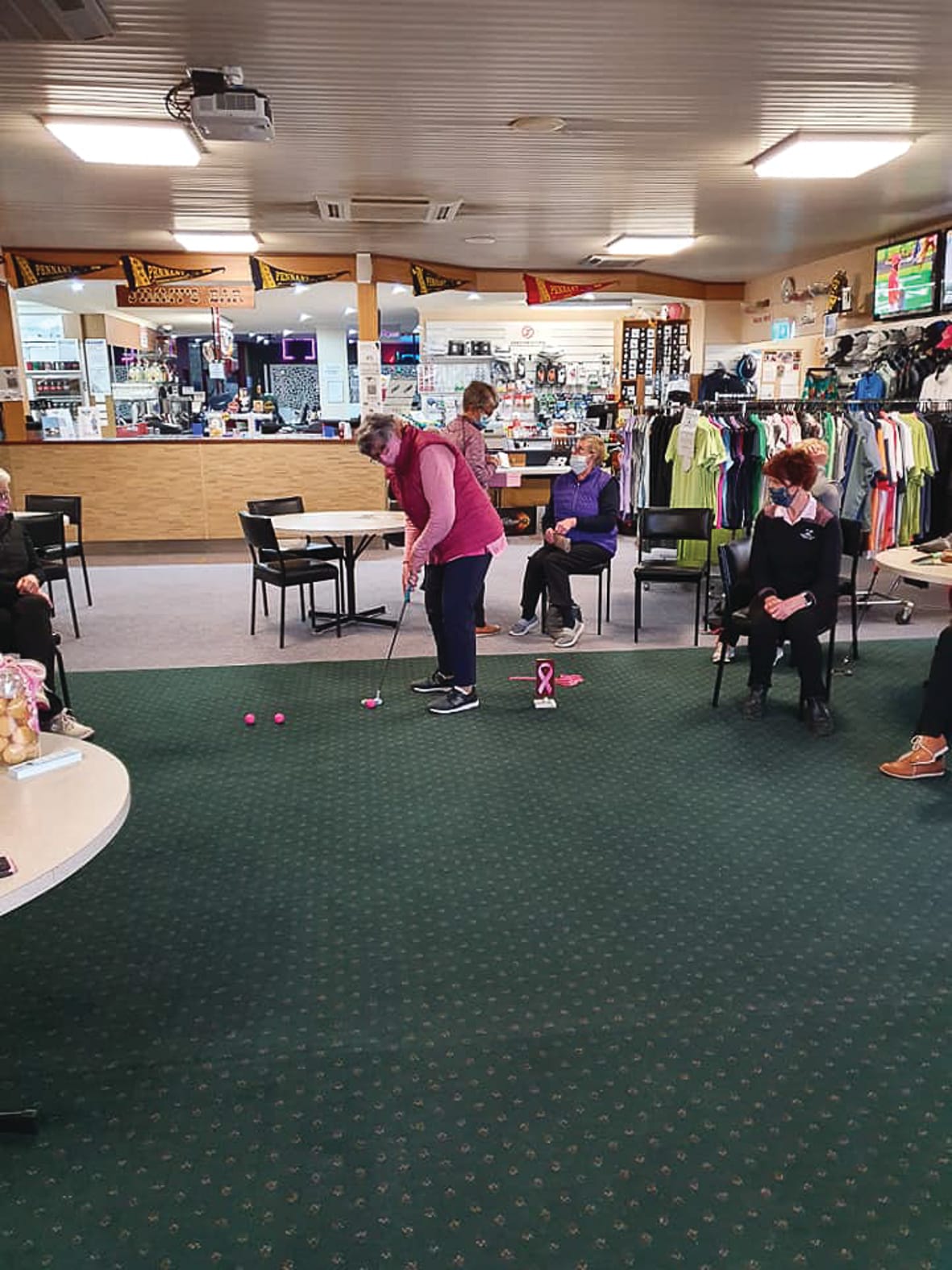 Fun(d) raiser … Merren Carr tries her hand at putting on the carpet.
