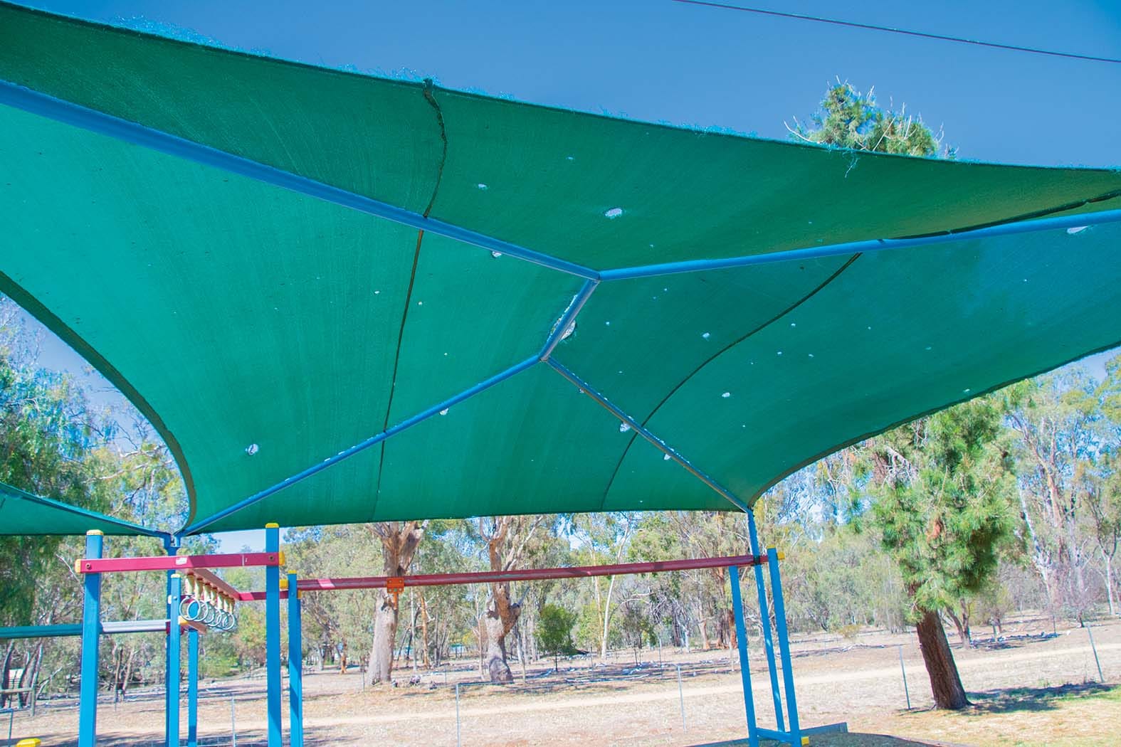 Holes everywhere ... Nearly all of the damage on these shade sails has been done in just the past two weeks. 
