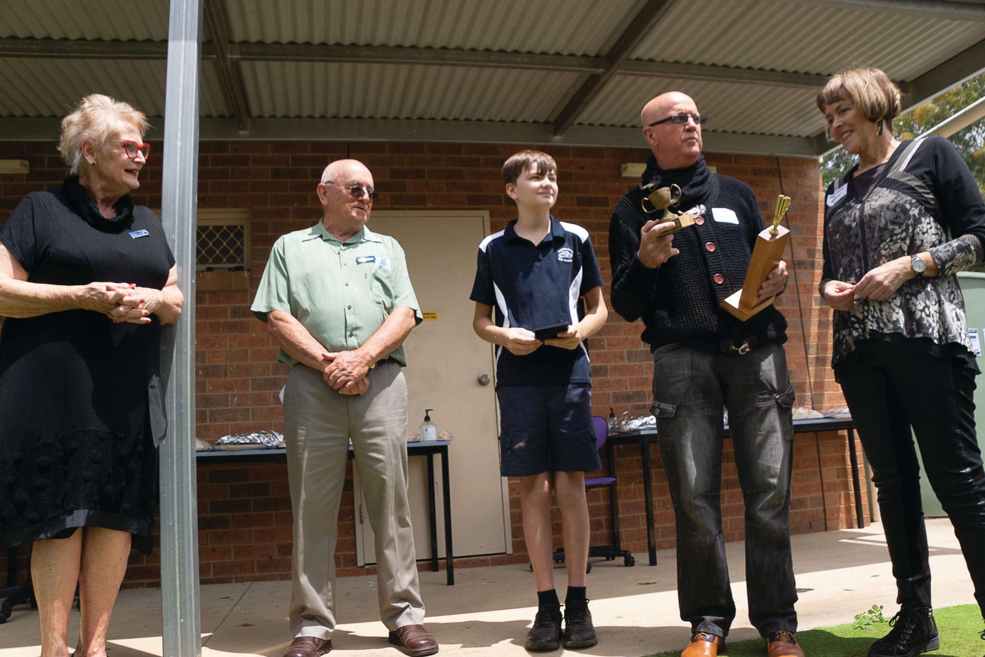 Kelly cup... Former principal Shaun Kelly (second from right) presents his own award to William Barnes (middle) with wife Heather (right) by his side, as well as Wayne Smith and Liz Oudemann. 
