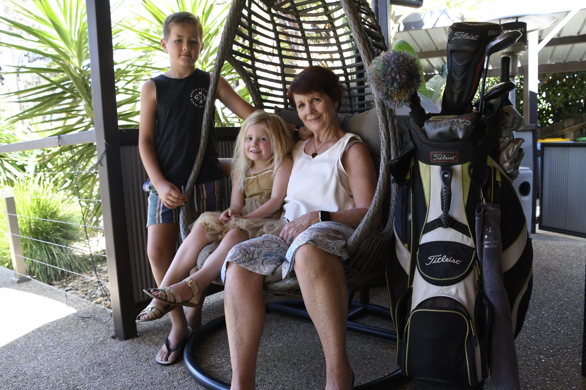 Family, golf and relaxation ... This is how Bev Hutchins, with grandchildren Lenny and Harper, hopes to spend her retirement.