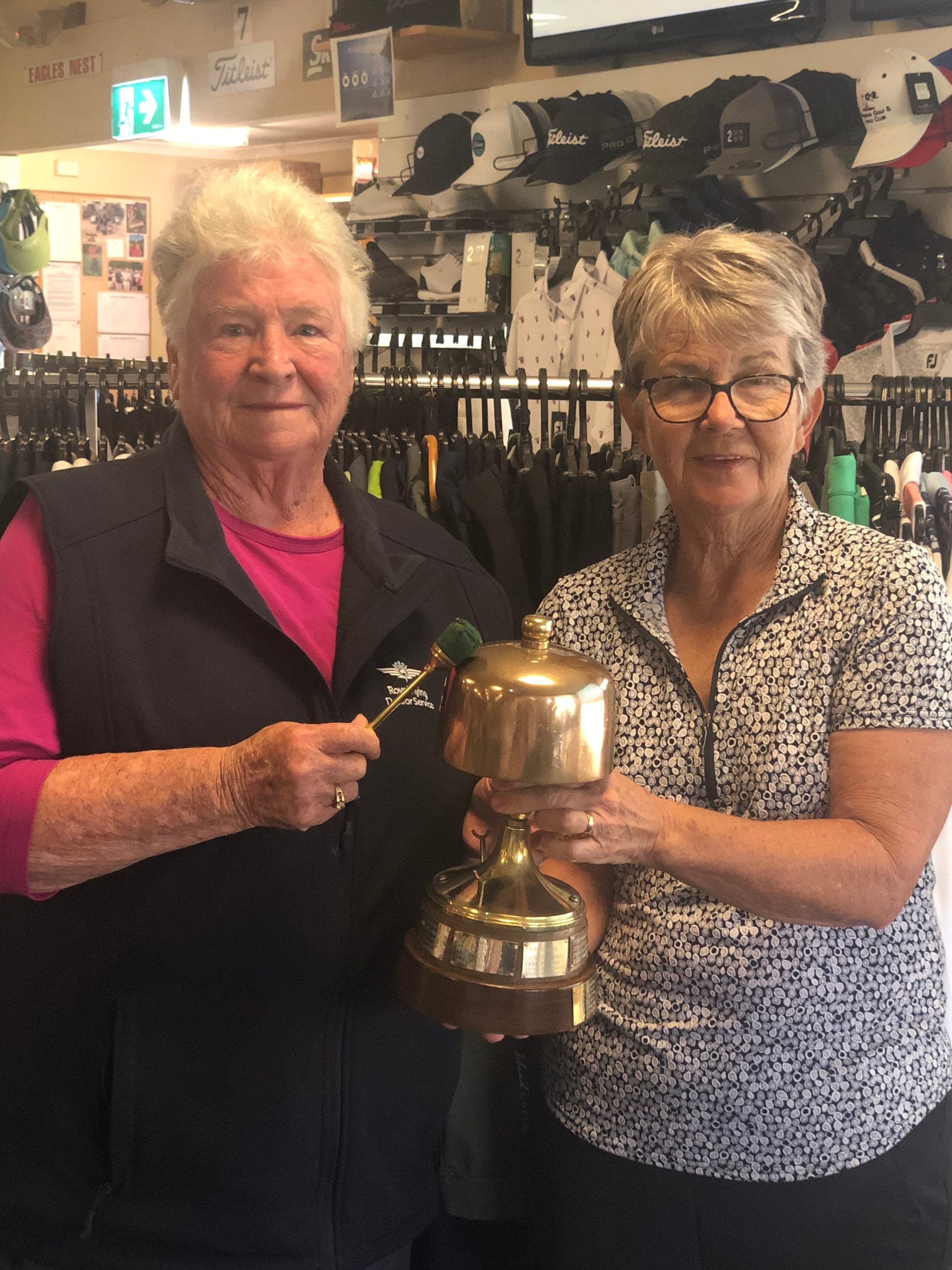 Changing hands... Nathalia captain Dawn Morrison (left) gleefully accepts the gong from Julie Hannaford.
