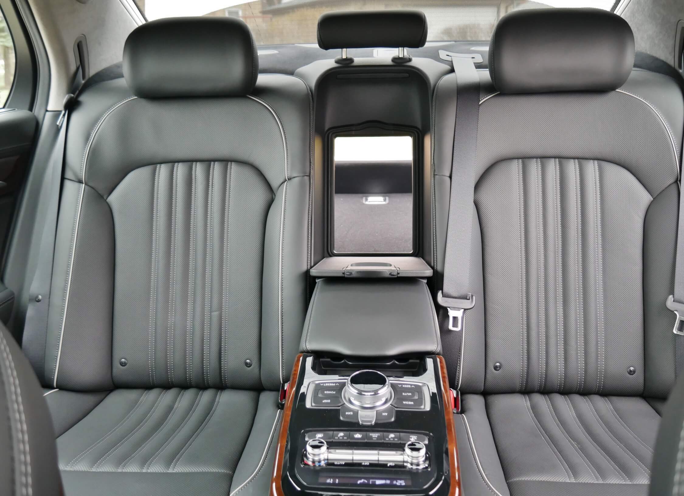 2018 Genesis G90 3.3T AWD: massive rear seat center armrest with seat, climate & audio controls and trunk pass through